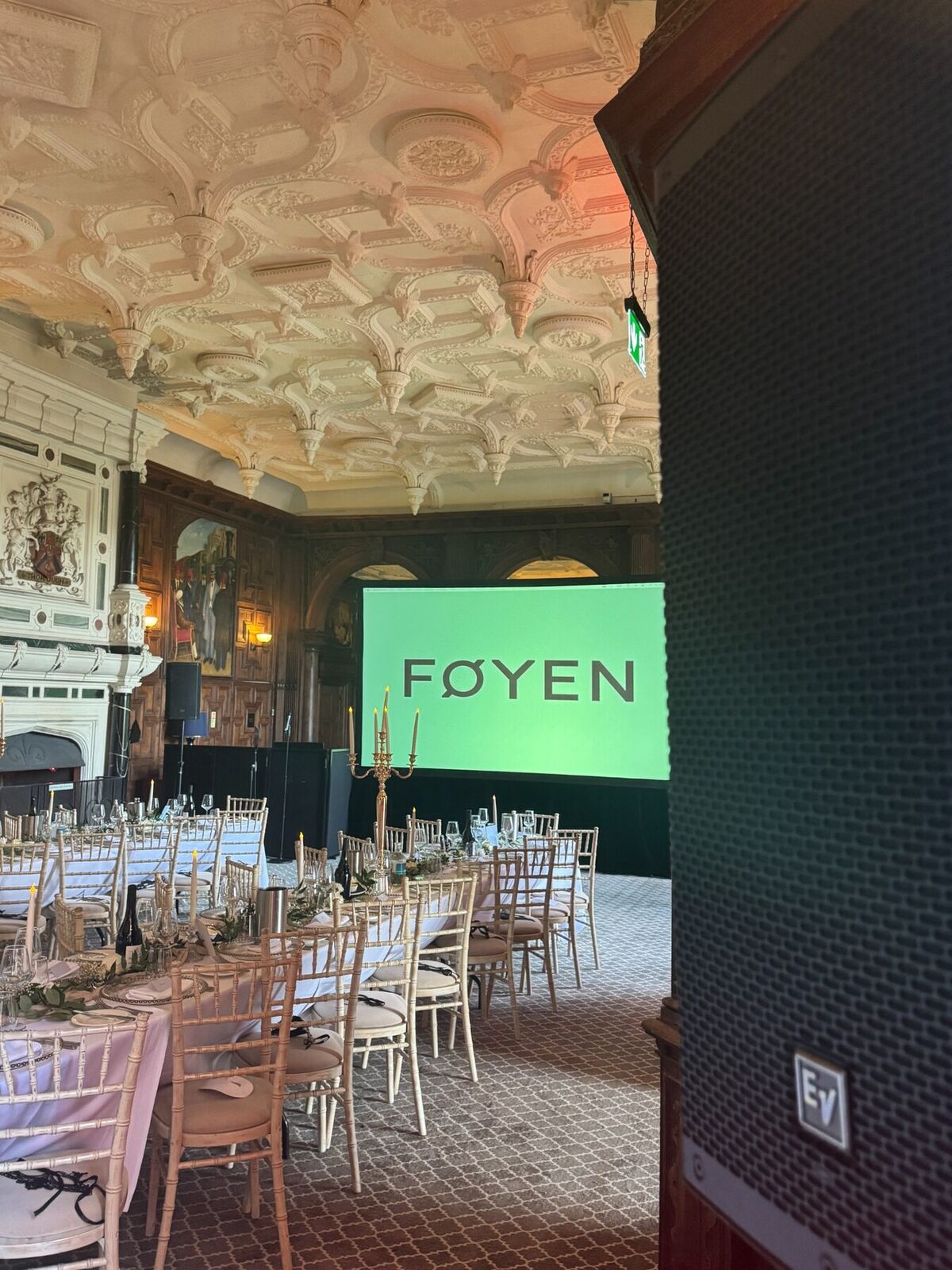 Projection and speaker system for an evening company dinner